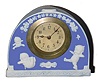 C.1910, German, Kewpie Copyrighted Jasperware, 30-hour lever movement porcelain novelty timepiece.