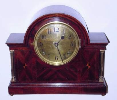 C.1925, William L. Gilbert Clock Co., Winsted, Conn 8-day time + strike mantel clock, in the French style, with turned brass columns. — Antique Clocks Price Guide