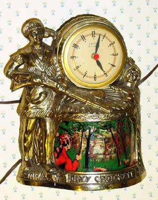C.1940, United Clock Corp, Brooklyn, NY, MODEL 353, Davy Crockett, 110v , electric timepiece, light and animation. — Antique Clocks Price Guide