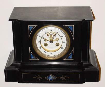 C.1890, French, for Palmer Bachelder's and Co., Boston, BLACK SLATE mantel clock with blue onyx inserts and gilt trim, clean movement with open escapement on dial. — Antique Clocks Price Guide