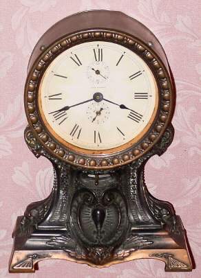 C.1915, Seth Thomas Clock Co., Thomaston, Conn, "OWL ALARM", patinated white metal base with stamped brass movement surround. — Antique Clocks Price Guide