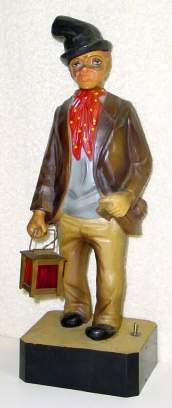 C.1955, Japan, plastic copy of a German Whistler , MAN WITH LANTERN IN HAND, whistling a lively tune, powered by an electric motor and 2 "D" cells in the base, on-off switch on right side of base. — Antique Clocks Price Guide