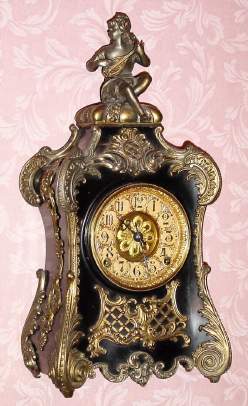 C.1895, F. Kroeber Clock Co., New York, NY, "Pompadour" , 8-day time/strike enameled iron mantel clock in the French style. — Antique Clocks Price Guide