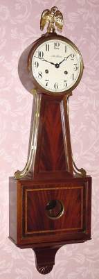 C. 1985, Seth Thomas Clock Co., Norcross, Georgia, Plymouth Hollow , time and rod strike banjo clock (marked Germany on dial). — Antique Clocks Price Guide