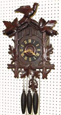 C.1905, German, 30-hour Cuckoo and Quail [quarter strike] clock marketed by Sears, Roebuck and Co. — Antique Clocks Price Guide