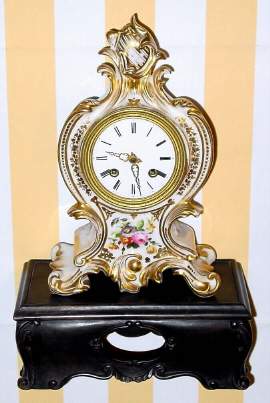 C.1840, French, B and C, Paris, gold and floral decorated porcelain clock on carved wooden base. — Antique Clocks Price Guide