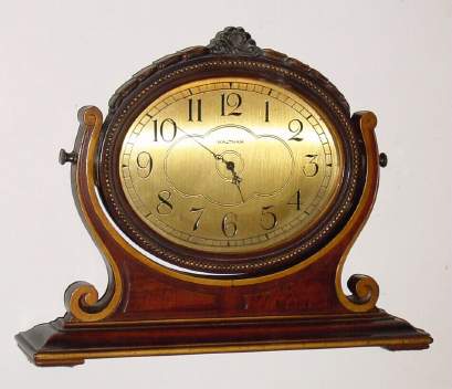 C.1927, Waltham Watch Co., Waltham, Mass , Easel clock, of walnut, attractively carved, waterfall design. — Antique Clocks Price Guide
