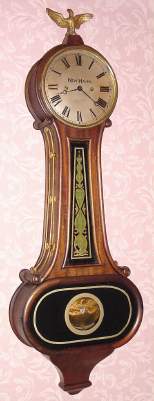C.1920, New Haven Clock Co., "Wilson" , 30-day banjo timepiece, with oval lower door. — Antique Clocks Price Guide