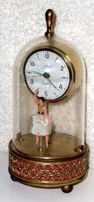 C.1950, German, W. Schmid-Schlenker, "Darling" , 30-hour musical novelty alarm timepiece, under plastic dome. — Antique Clocks Price Guide