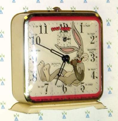 C.1951, E. Ingraham and Co., Bristol, Conn, "Bugs Bunny" , 30-hour novelty alarm timepiece (Bug's left hand has a carrot, rocking in and out as he appears to eat it). — Antique Clocks Price Guide