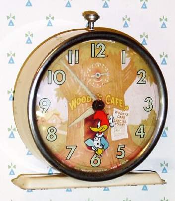 C.1959, Columbia Time Products, "Woody Woodpecker" , 30-hour novelty alarm timepiece (Woody rocks back and forth as clock ticks). — Antique Clocks Price Guide