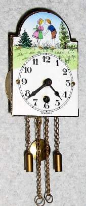 C.1955, German, Wintermantel, Mini Pendulette, THE LOVERS, with porcelain dial, one day duration, running. — Antique Clocks Price Guide