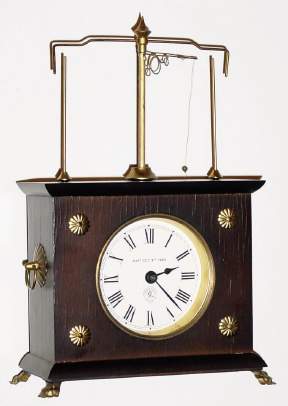 C.1975, The Horolovar Co. (C. Terwilliger, NY) , IGNATZ Flying Pendulum Clock, repro of the Jerome and Co. original. — Antique Clocks Price Guide
