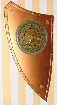 C.1890, French, 8-day novelty timepiece in the form of a shield. — Antique Clocks Price Guide