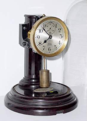 C.1930, Poole Manufacturing Co., Ithaca, NY, Executive battery timepiece, wrong pendulum. — Antique Clocks Price Guide