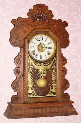 C.1901 Ansonia Clock Co., NY, "Kenmore" , 8-day time/strike/alarm gingerbread clock. — Antique Clocks Price Guide