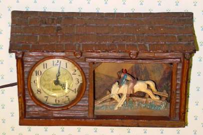 C.1947, Haddon Products Corp, Chicago, THE RANCHO , 110v, timepiece with rocking horse and rider to the right. — Antique Clocks Price Guide