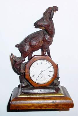 C.1876 [dated case], Mini Black Forest, Mountain Goat and Kid, with English fusee watch in a walnut bezel with coin silver rear cover with date and Paris Exhibition. — Antique Clocks Price Guide