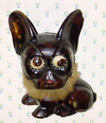 C.1948, German, Oswald, Molded DOG, model No. 16, one day novelty timepiece, time told by the position of the rotating eyes. — Antique Clocks Price Guide