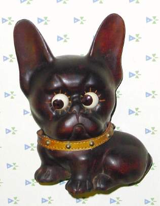C.1926, German, Oswald, Small Carved Wood DOG WITH STUDDED COLLAR, this uncommon small model with tiny eyes, still showing the time by the position of the pupil. — Antique Clocks Price Guide
