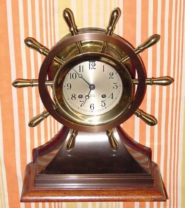 C.1949, Chelsea Clock Co., Boston, MARINER , 4.5" dial, sometimes called the Yacht Wheel model, 8-day Ship's Bell strike, serial No. 553733. — Antique Clocks Price Guide