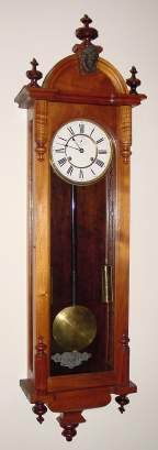 C.1900, Ansonia Clock Co., NY, CAPITAL , oak cased wall clock, 2-weight time only. — Antique Clocks Price Guide
