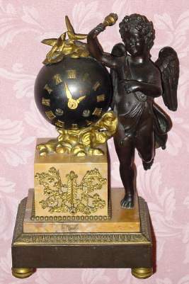 C.1875, French, Vincenti and Cie, bronze and marble figural clock, with tiny 8-day gong strike movement . — Antique Clocks Price Guide
