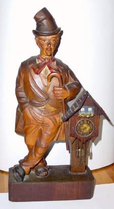 C.1925, German, Karl Griesbaum, Whistler and Clock, the man with cane and hat leaning against a clock, mounted to a post. — Antique Clocks Price Guide