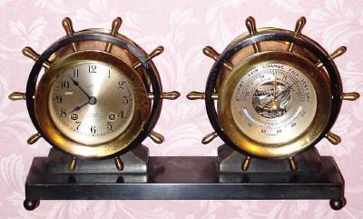 C.1965, Chelsea Clock Co., Boston, Mass., "Claremont" , 8-day ship's bell clock and barometer set in a two-tone yellow brass and bronze finish Red Brass case retailed by Negus, New York. — Antique Clocks Price Guide