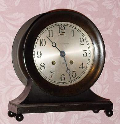 C.1922 Chelsea Clock Co., Boston., Mass., "Base and Ball ", 8-day, Ship's Bell clock, 6" dial, bronze case, Serial No. 151539, retailed by "Shreve, Crump and Low Co., Boston". This model was also named the Commodore and the Constitution. — Antique Clocks Price Guide