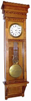 C.1910, Wm L. Gilbert Clock Co., Winsted, Conn, Regulator No. 12, Hanging, oak cased jeweler's regulator, 8-day with center seconds and maintaining power, 1-weight, direct drive. — Antique Clocks Price Guide
