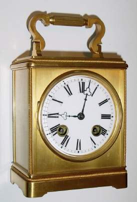 C.1880, French, Samuel Marti, SHIP'S BELL Carriage clock, the gilt case with rope trim at all corners, top and bottom, a pull cord out the bottom for synchronizing the strike. — Antique Clocks Price Guide