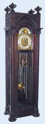 C.1905, Colonial Mfg Co., Zeeland, MI, GOTHIC HALL CLOCK , 3-weight, 9-tubular bell, Whittington and Westminster chimes, in mahogany. — Antique Clocks Price Guide