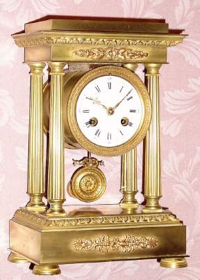 C.1890, French, Empire style, 8-day time/strike 4-pillar mantel clock in ormolu. — Antique Clocks Price Guide
