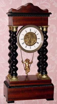 C.1870, Japy Fils (1855 Award Medallion), SWINGING DOLL , in an Empire style case with 4 barley twist columns, striking. — Antique Clocks Price Guide