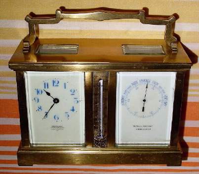 C.1905, French for the English Market, brass cased carriage "Weather Station", the clock to the left and Aneroid barometer to the right, and with thermometer in the center. — Antique Clocks Price Guide