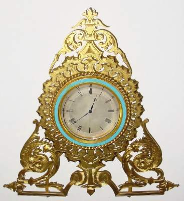 C.1890, Swiss for the London market, engraved and gilt strut clock, with a jeweled lever, rear wind and set movement. — Antique Clocks Price Guide