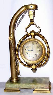 C.1880, French, Dock Theme Industrial series clock, a davit with chain drive blocks and pulleys, the hoist holding a large carriage in which is mounted an 8-day timepiece. — Antique Clocks Price Guide