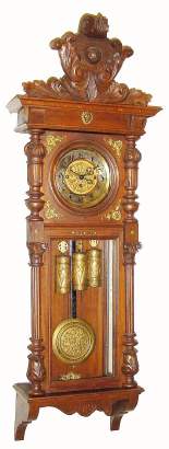 C.1890, German, Gustav Becker, 3-Weight Grand Sonnerie wall clock in walnut and veneers, in double door style with bracket base and applied brass trim. — Antique Clocks Price Guide