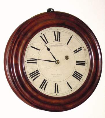 C.1848, Brewster and Ingrahams, Bristol, Conn , round mahogany gallery clock, case of 8 glued sections, turned round, with an "east-west" type timepiece movement and wooden dial. — Antique Clocks Price Guide