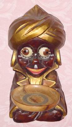 C.1948, German, Oswald / OSUHR, cast composition "SHEIK" novelty timepiece, 1-day, time indicated by the position of the eye pupils. — Antique Clocks Price Guide