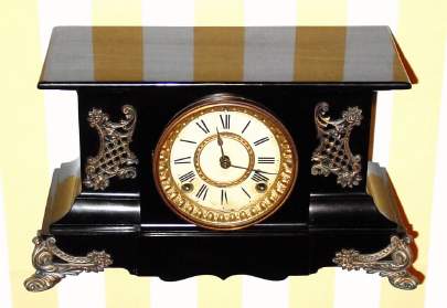 C.1904, Ansonia Clock Co., NY., "Grenada" , 8-day time/strike enameled iron mantel clock. — Antique Clocks Price Guide