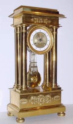 C.1840, French, 4-pillar Empire style mantel clock, 8-day bell strike, with grid iron pendulum. — Antique Clocks Price Guide