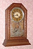  C.1908, Sessions Clock Co., Forestville, Conn., "Unique 1", 8-day mantel timepiece. It is unusual to find gingerbread type clocks as timepieces, but the "Unique" line was Sessions attempt at cheaper items. 