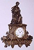  C.1874, Seth Thomas' Sons and Co, NY, "No. 8028", 8-day time and strike figural mantel clock, seated lady with a flute and sheet music in her lap, beside an oil lamp. 