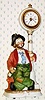  C.1987, Japan, Bisque figure of WHISTLING WILLIE, who whistles "3 O'Clock in the Morning", while turning his head from side to side, small quarts timepiece movement in street clock. 