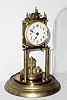  C.1905, Kienzle Clock Factories, 400-day torsion timepiece in very good condition with an original disc pendulum. 