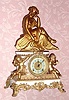  Mixed lot, good parts, C.1904 Ansonia Clock Co., 8-day time/strike figural mantel clock, SIBYL base with incorrect top statue. 