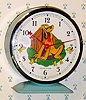  C.1964, Bayard, France, "Pluto" , 30-hour novelty alarm timepiece (Pluto's head rocks back and forth as clock runs).