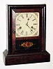  C.1890, Wm L. Gilbert, Winsted, Conn, Rosewood, COUPON model, 30 hour time and strike cottage clock. 